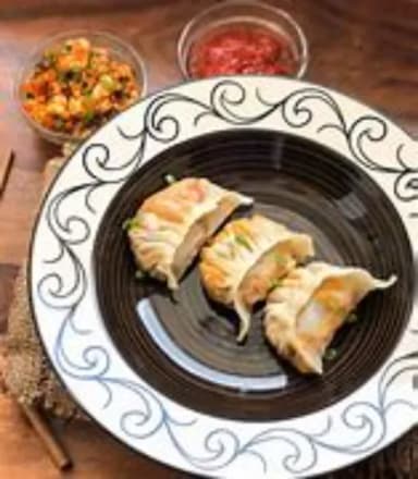 Best Chicken Schezwan Momos in Ernakulam